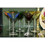 A SET OF EIGHT HARLEQUIN COCKTAIL GLASSES, with clear glass barley twist stems, height 15cm (