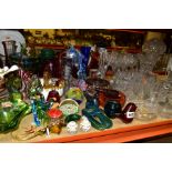 A COLLECTION OF COLOURED AND CLEAR GLASSWARE, including a Wedgwood red bird paperweight, an
