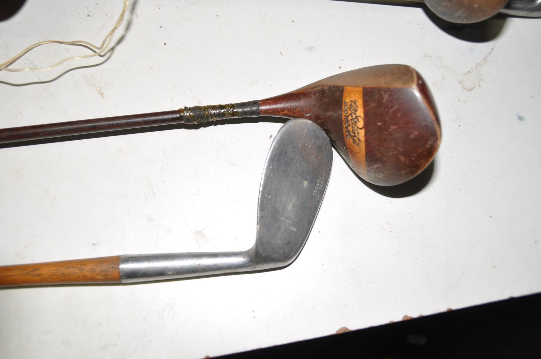 A VINTAGE GOLFBAG containing Wilson, Cochnamer, Leyland irons and A Burton, three other woods and - Image 2 of 3