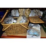 A WICKER BASKET OF SEWING EQUIPMENT AND TWO BOXES OF BUTTONS, CUSHIONS, etc, including part used