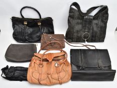 SIX BAGS, to include a black leather Warehouse tote bag, a brown suede Vimoda bag with alligator