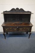 A 19TH CENTURY OR EARLIER OAK SIDEBOARD with a later raised back on fluted supports, carved with