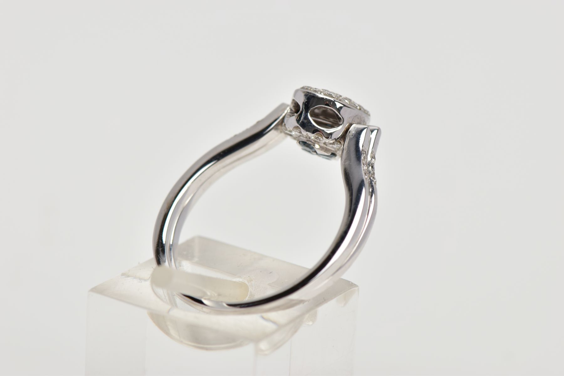 A DIAMOND SWIVEL RING, designed as an oval swivel panel, one side set with twenty-five brilliant cut - Image 3 of 6