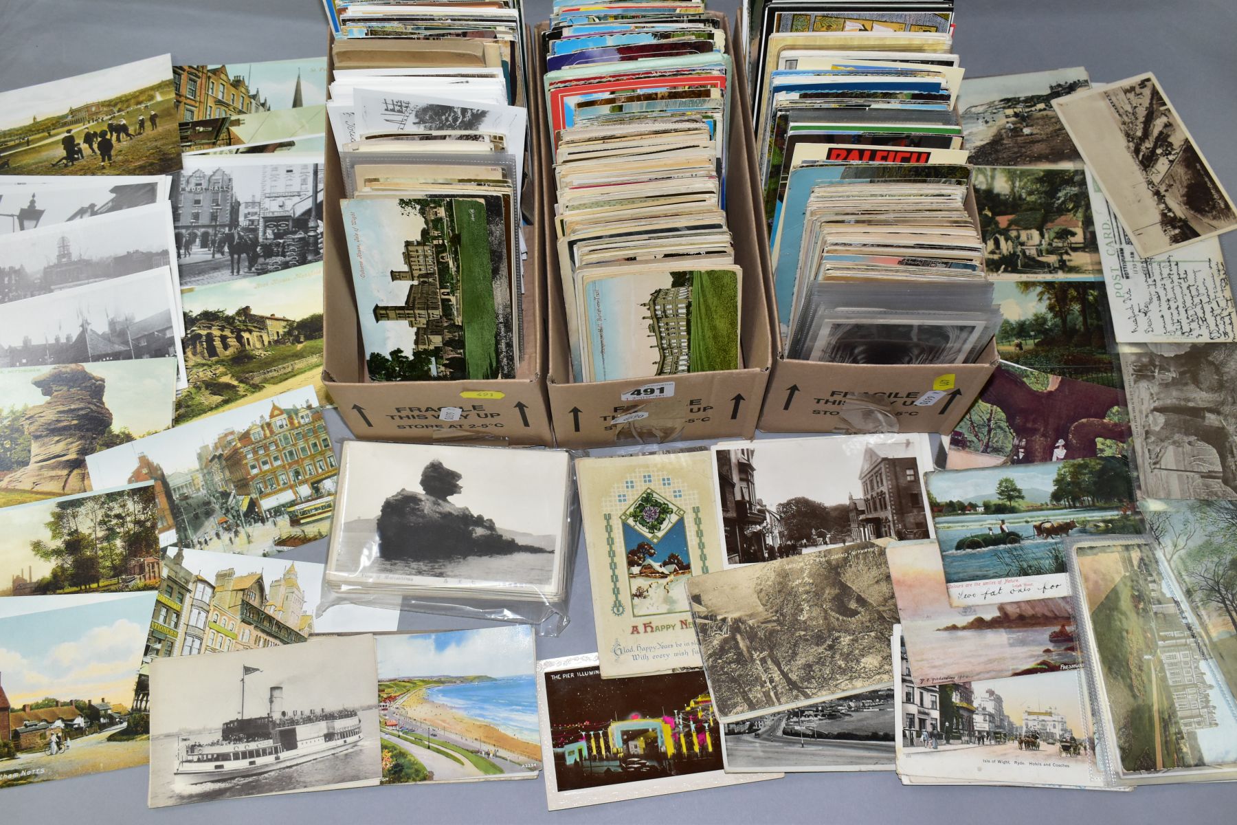 POSTCARDS, approximately 1300 - 1400 postcards in three boxes, box 1 contains a mixture of