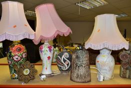 A LATE 19TH CENTURY DECORATIVE TIMEPIECE, CERAMIC TABLE LAMPS AND VASES, comprising a small easel