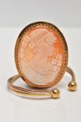 A 9CT GOLD CAMEO BROOCH AND TRI-COLOUR TORQUE BANGLE, the oval shell cameo depicting a lady in
