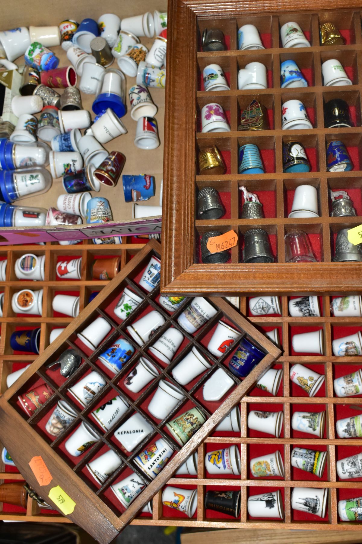 OVER TWO HUNDRED COLLECTORS THIMBLES, mostly holiday souvenirs, to include ceramic, pewter, brass