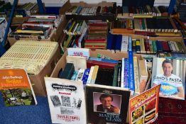 BOOKS, approximately 250 titles in eight boxes consisting of hard back and paperback publications,