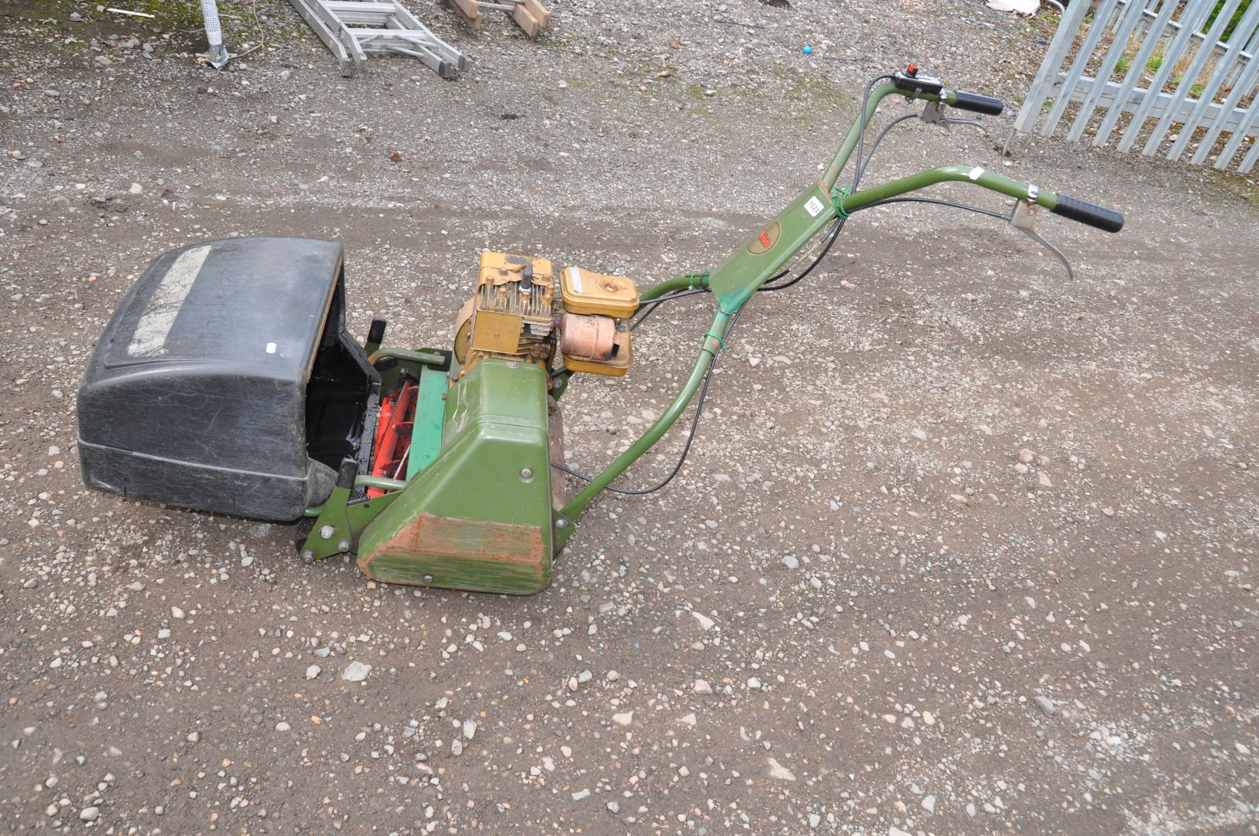A VINTAGE WEBB AB1474 PETROL CYLINDER MOWER with a Briggs and Stratton 2 hp motor ( engine pulls