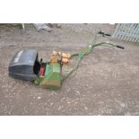 A VINTAGE WEBB AB1474 PETROL CYLINDER MOWER with a Briggs and Stratton 2 hp motor ( engine pulls