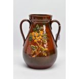 A LONG PARK TORQUAY TWIN HANDLED VASE with floral decoration, 10cm