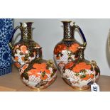 A PAIR OF ROYAL CROWN DERBY IMARI 2444 PATTERN EWERS AND A PAIR OF SQUAT BULBOUS TWIN HANDLED