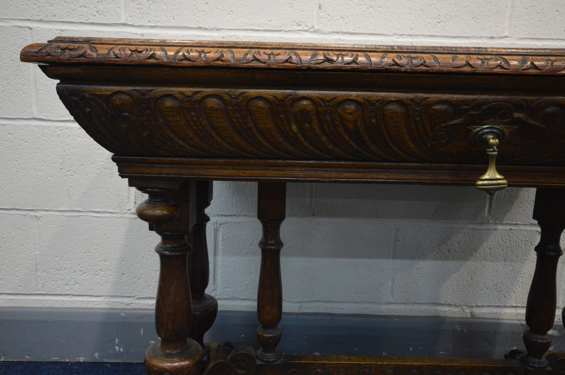 A 19TH CENTURY CARVED OAK CENTRE TABLE, rectangular top above a tapered frieze containing a long - Image 3 of 5