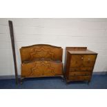 AN EARLY 20TH CENTURY QUARTER VENEERED WALNUT TALL BOY, with three drawers, width 77cm x depth