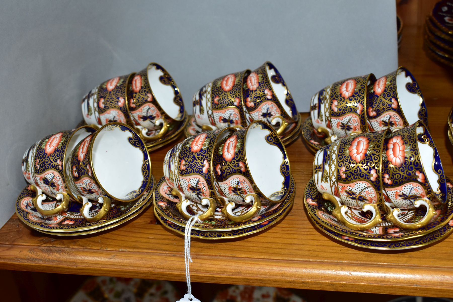 A LATE 19TH CENTURY SET OF TWELVE ROYAL CROWN DERBY IMARI COFFEE CUPS AND SAUCERS IN THE 4591