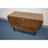 A GEORGIAN OAK OVAL GATE LEG TABLE, on square block legs, brass caps and casters, width 43cm x