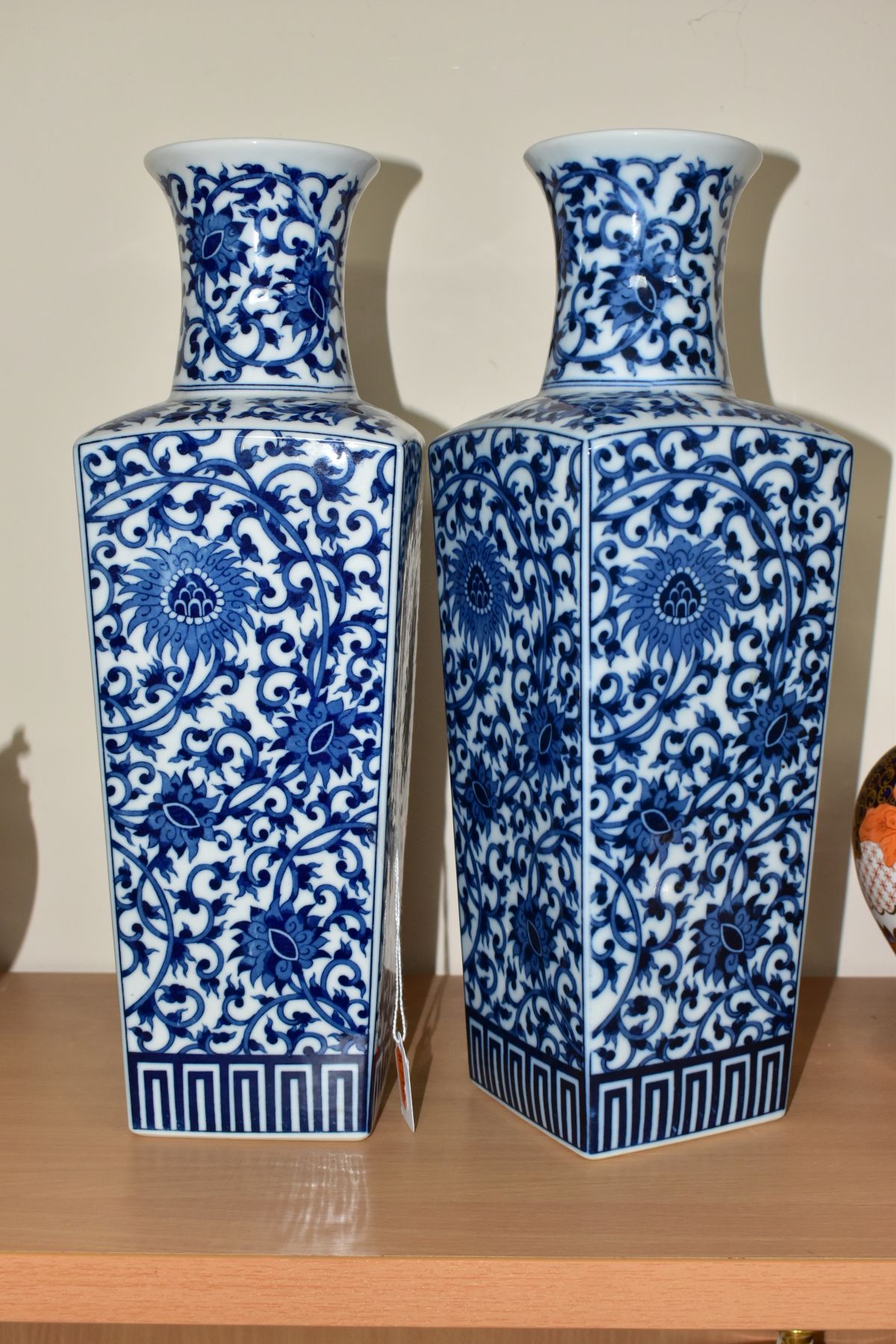 A PAIR OF 20TH CENTURY ORIENTAL PORCELAIN BLUE AND WHITE TRANSFER PRINTED VASES OF TAPERING SQUARE - Image 2 of 5