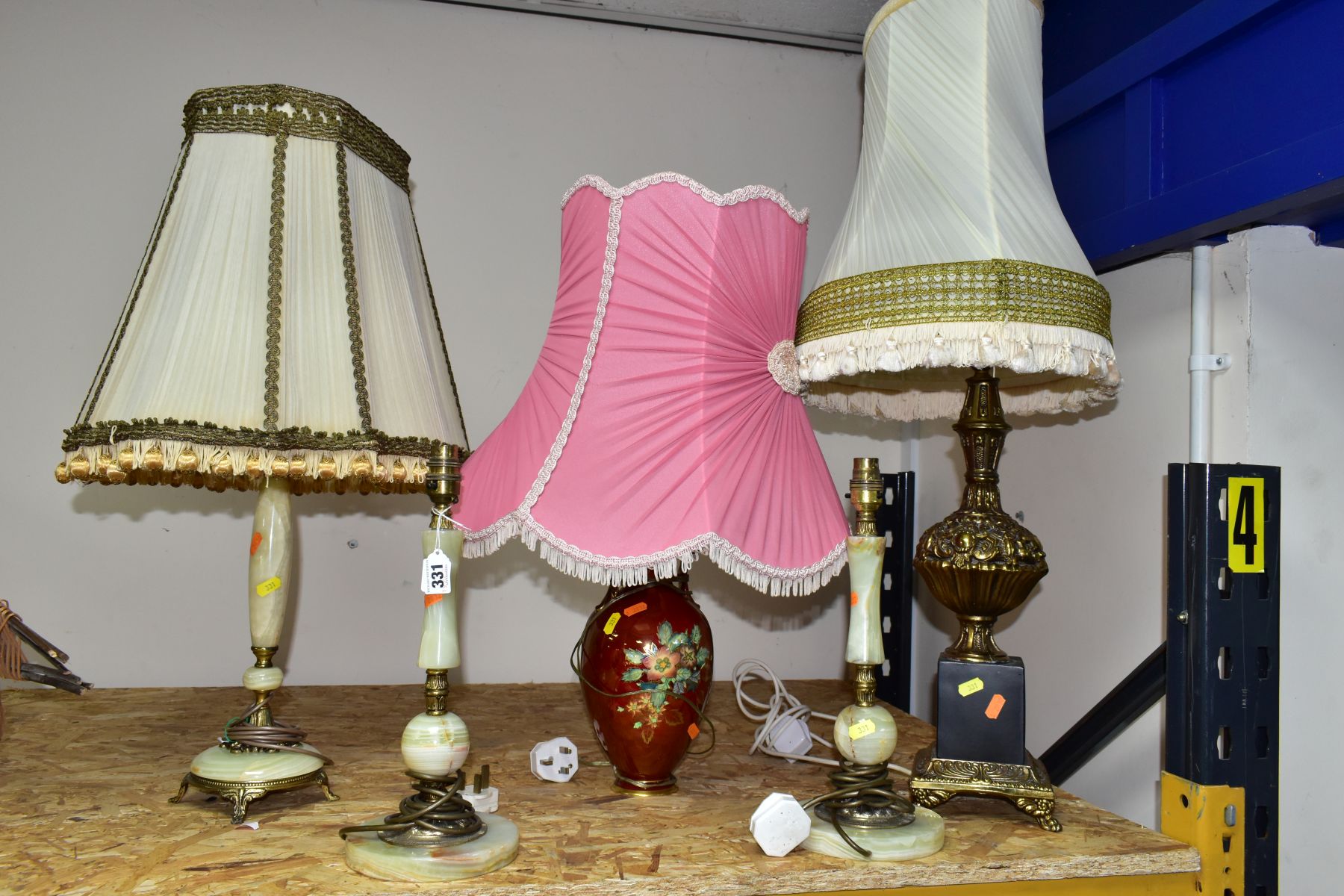 A GROUP OF FIVE TABLE LAMPS, comprising a pair of onyx and gilt metal lamp bases, height 36cm to