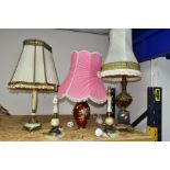 A GROUP OF FIVE TABLE LAMPS, comprising a pair of onyx and gilt metal lamp bases, height 36cm to