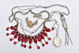 FOUR ITEMS OF JEWELLERY, to include a niello chain necklace, a red glass necklace, an oval silver