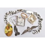 SEVEN ITEMS OF SILVER AND WHITE METAL JEWELLERY, to include a miniature hinged purse, an RAF brooch,