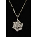 A DIAMOND SNOWFLAKE PENDANT, a cluster design of round brilliant cut diamonds, pendant measuring