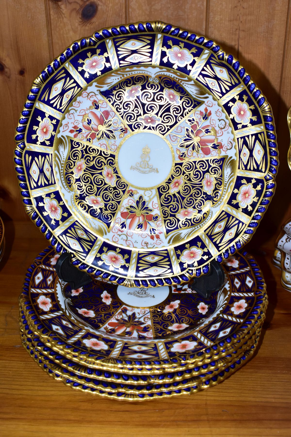 A SET OF SIX ROYAL CROWN DERBY IMARI SILVER SHAPE DESSERT PLATES IN THE 2451 PATTERN, the centre