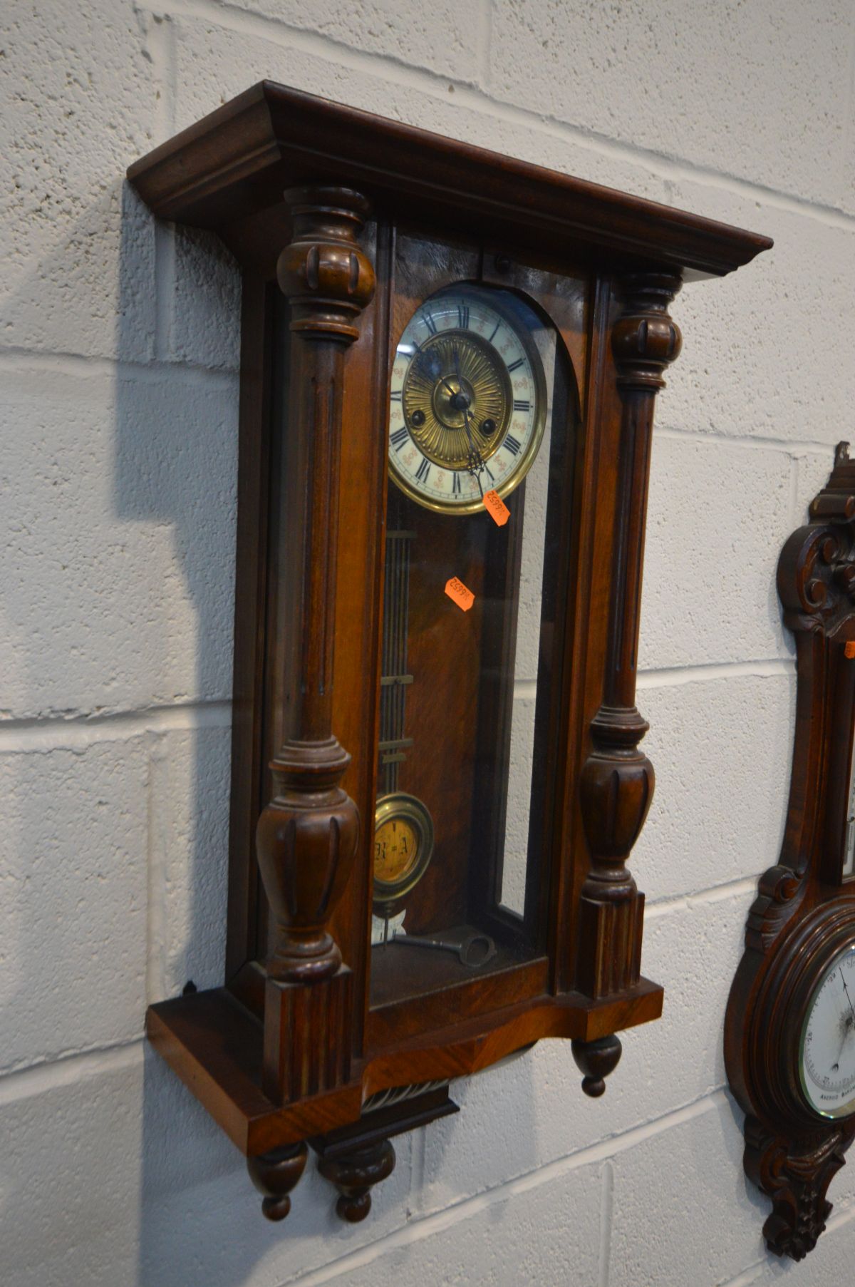 AN EARLY 20TH CENTURY WALNUT VIENNA WALL CLOCK, height 76 cm (missing pediment) (winding key and - Image 2 of 3