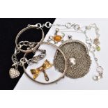 A SELECTION OF JEWELLERY, to include a horse bit bracelet, a child's bangle, a hinged bangle, a