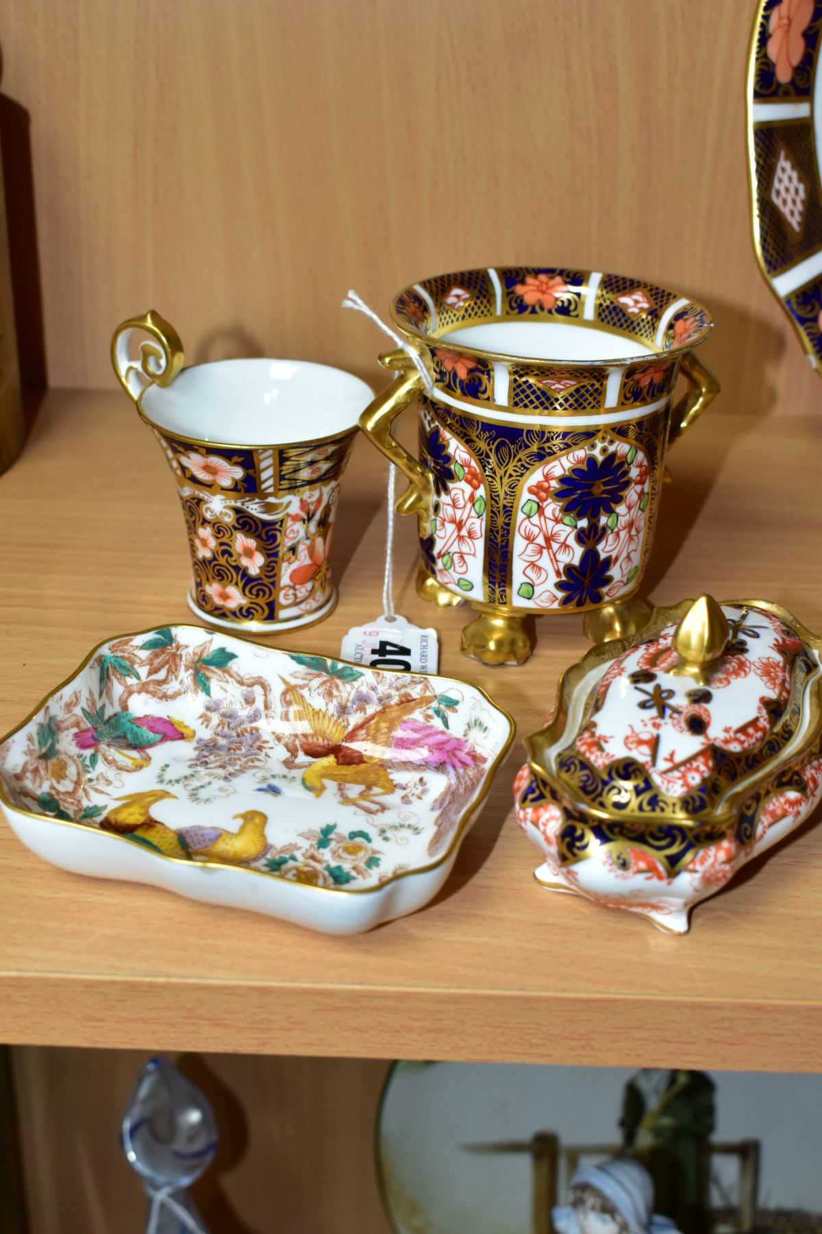 FOUR PIECES OF ROYAL CROWN DERBY, comprising a twin handled cylindrical 1128 pattern vase with