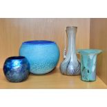 FOUR STUDIO GLASS VASES, to include an Adrian Sankey onion shaped iridescent vase, with peacock
