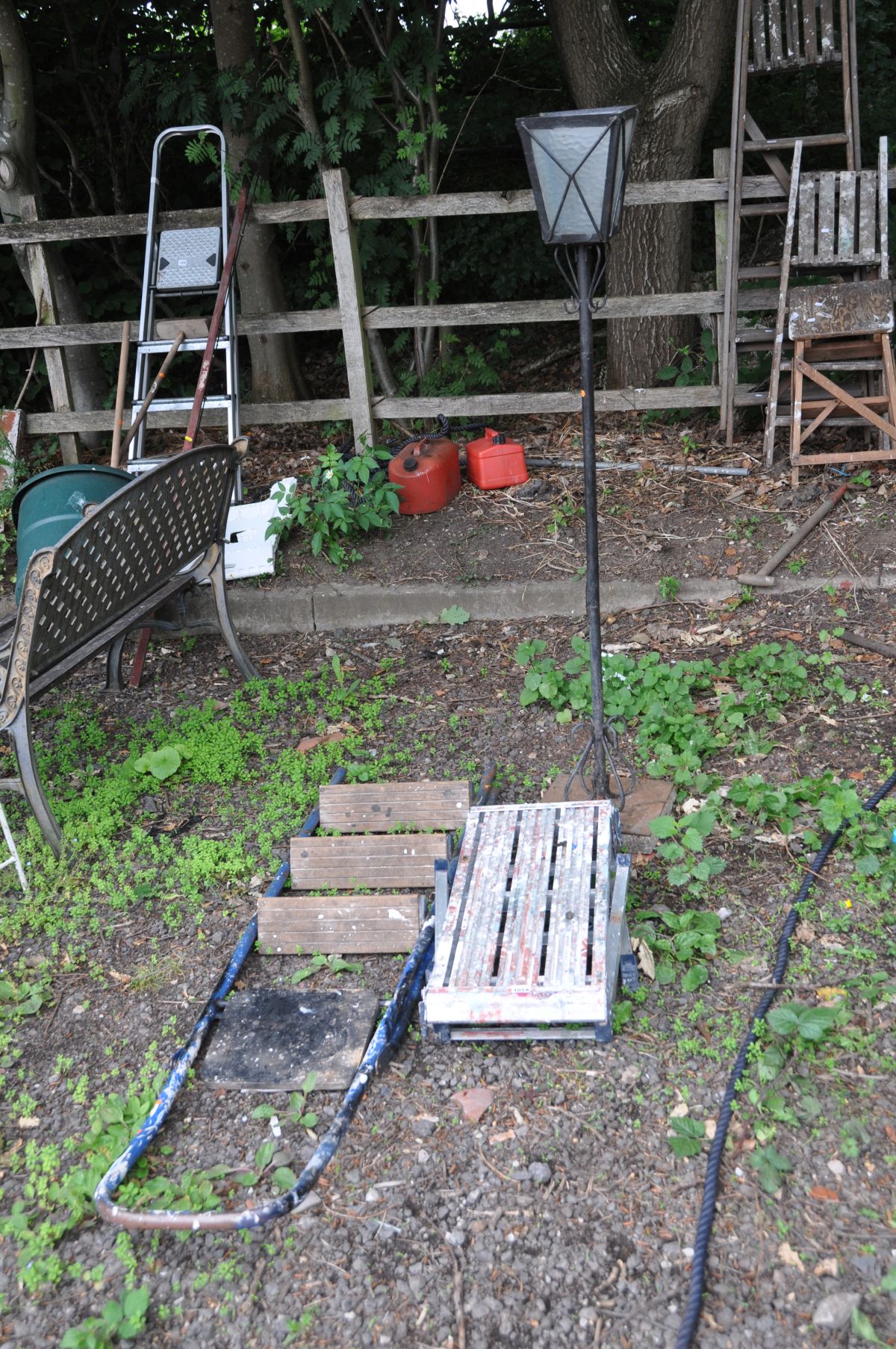 A METAL AND WOOD STEP LADDER, an aluminium step stool and a wrought iron garden lamp (no lid to top)