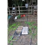 A METAL AND WOOD STEP LADDER, an aluminium step stool and a wrought iron garden lamp (no lid to top)