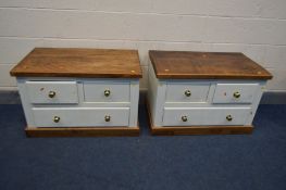 A PAIR OF PARTIALLY WHITE PAINTED PINE AND HARDWOOD BEDSIDE CABINETS with two short over one long