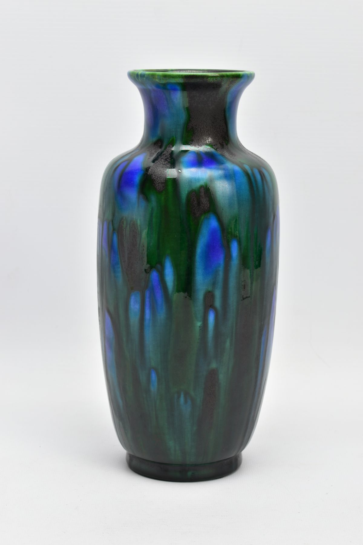 A MINTONS ASTRAWARE VASE, glazed in streaky blue and green, printed factory mark, height 10.5cm