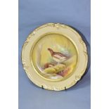 A MINTONS CABINET PLATE, painted by J E Dean 'ryper' (grouse in woodland) on cream ground with