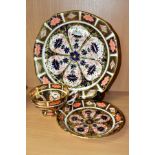 A ROYAL CROWN DERBY IMARI TEA CUP AND SAUCER AND A SHAPED SQUARE PLATE, the tea cup and saucer in