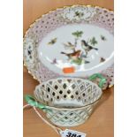 A HEREND PORCELAIN TWIN HANDLED BASKET WITH PIERCED DECORATION AND A SIMILAR OVAL HEREND DISH, the