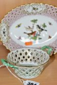 A HEREND PORCELAIN TWIN HANDLED BASKET WITH PIERCED DECORATION AND A SIMILAR OVAL HEREND DISH, the