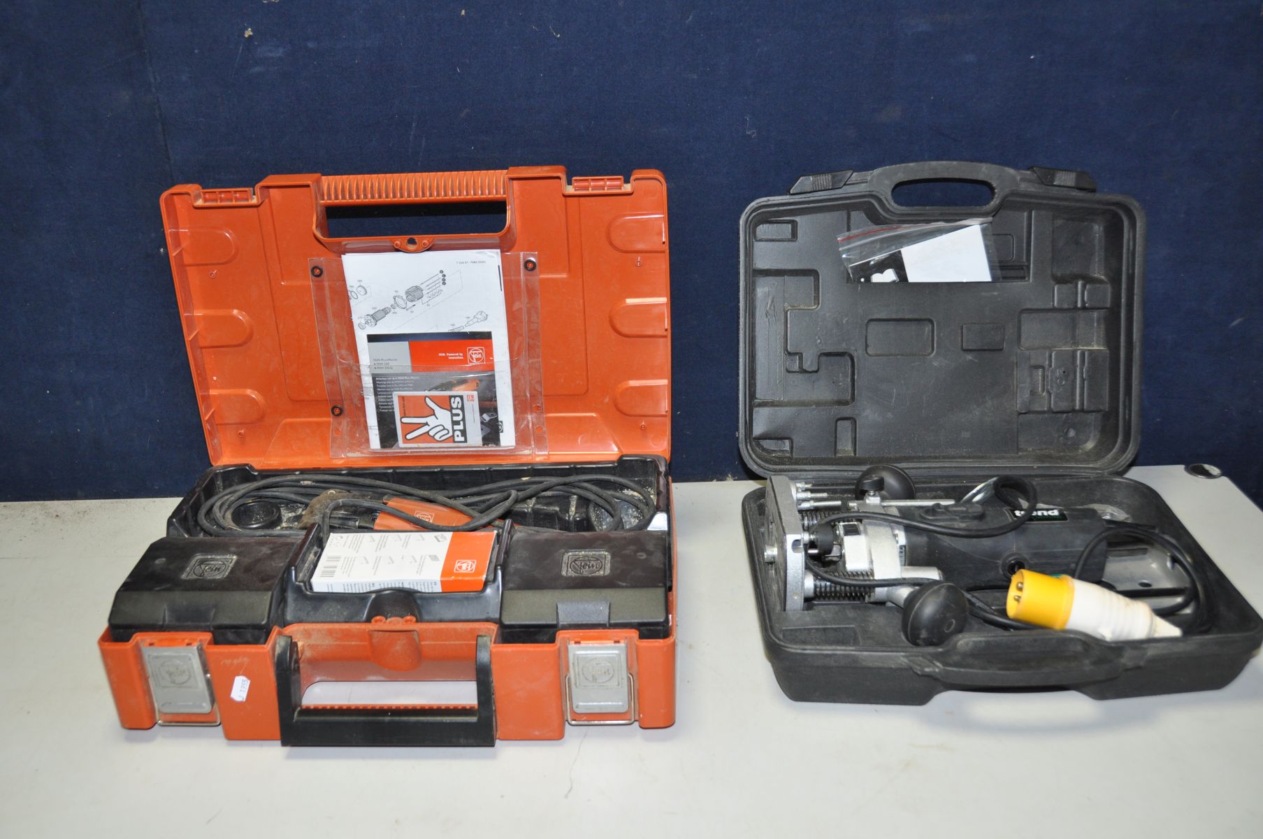 A FEIN MULTIMASTER FMM250Q 110v multi tool with attachments in case, 110v extension cord and a cased