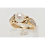 A MODERN CULTURED PEARL AND DIAMOND DRESS RING, centring on a cultured pearl to cross over diamond