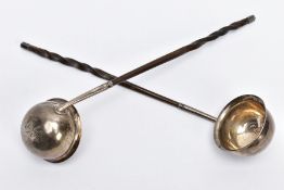 A PAIR OF SILVER TODDY LADLES with twisted whale bone handles, hallmarked London 1796 E.M. (