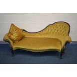 A VICTORIAN MAHOGANY CHAISE LONGUE, gold buttoned upholstery, foliate scrolled frame on cabriole