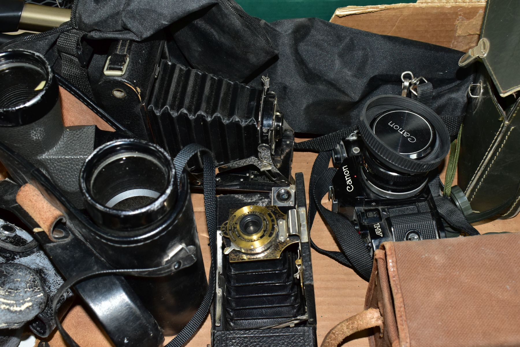 PHOTOGRAPHIC EQUIPMENT, ETC, comprising a Canon A1 SLR camera body fitted with a Canon FD 50mm f1. - Image 3 of 12