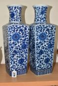 A PAIR OF 20TH CENTURY ORIENTAL PORCELAIN BLUE AND WHITE TRANSFER PRINTED VASES OF TAPERING SQUARE