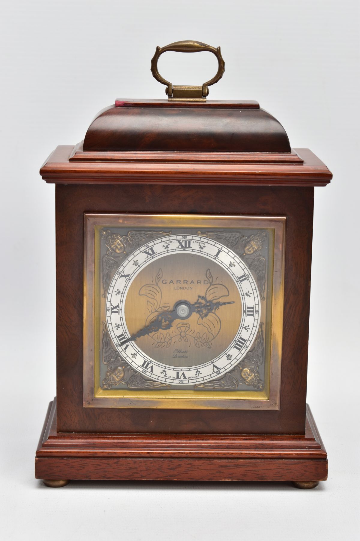 A BURR WOOD CASED GARRARD MANTLE CLOCK, London Elliott mantel clock the silvered ring set with Roman