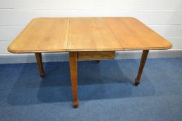 AN ARTS AND CRAFTS OAK GATE LEG TABLE, on square tapered legs, width 50cm x open width 106cm x depth