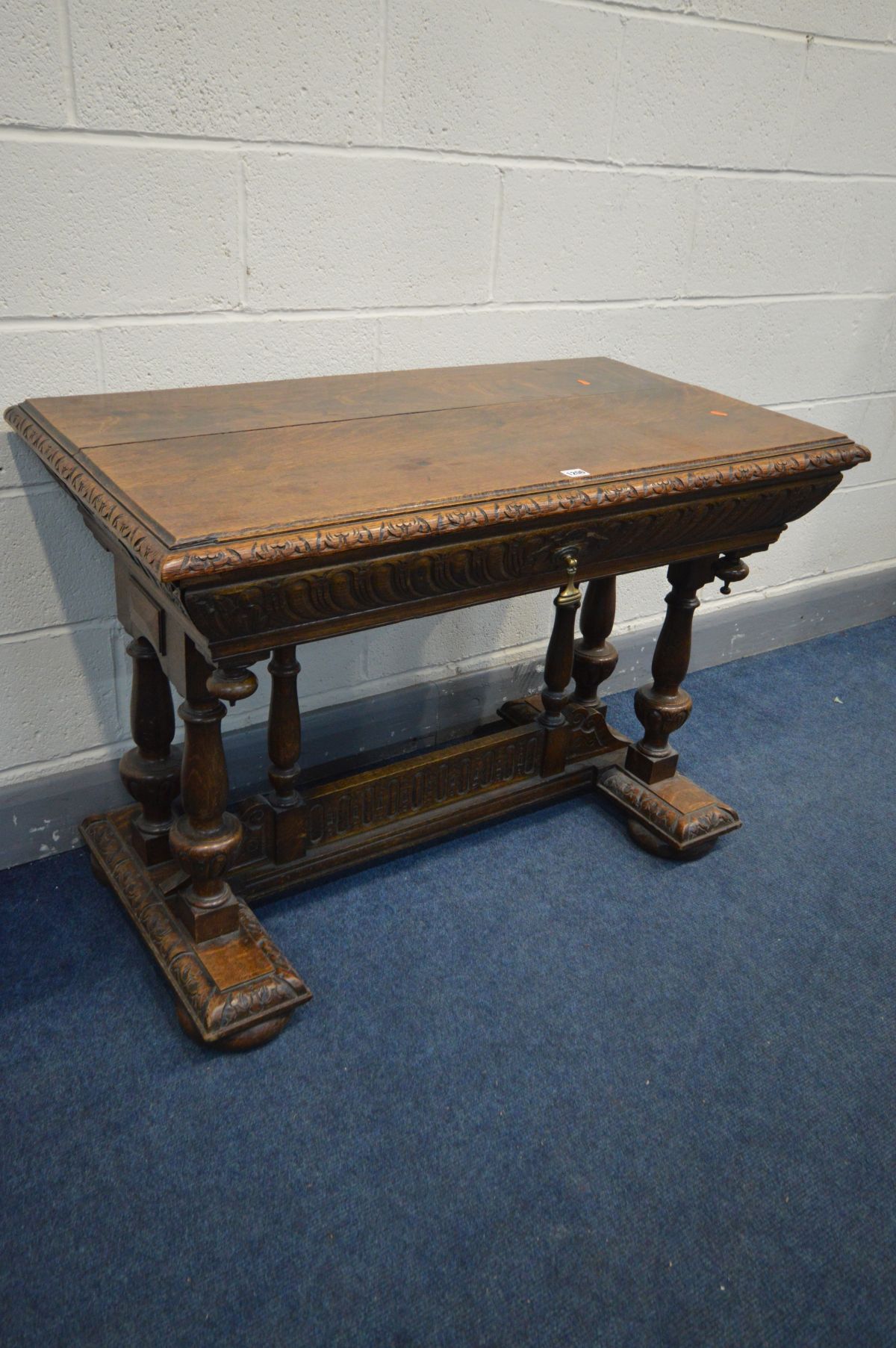 A 19TH CENTURY CARVED OAK CENTRE TABLE, rectangular top above a tapered frieze containing a long - Image 2 of 5