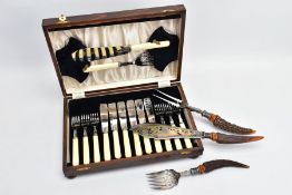 A CASED FISH FORK AND KNIFE SET AND A CARVING SET, a hinged wooden case containing a set of six fish