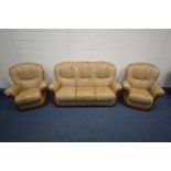 A LIGHT BROWN FAUX LEATHER THREE PIECE SUITE comprising a three seat settee, inner width 140cm and a